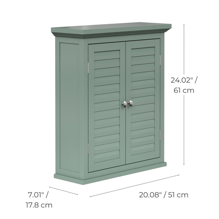 Dimensional graphic of a sage green wall cabinet with chrome knobs and two faux louvered doors in inches and centimeters.