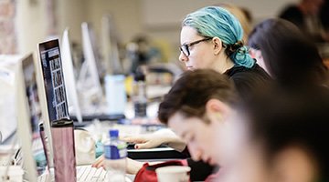 Image for Design students working at a desk using an Apple Mac