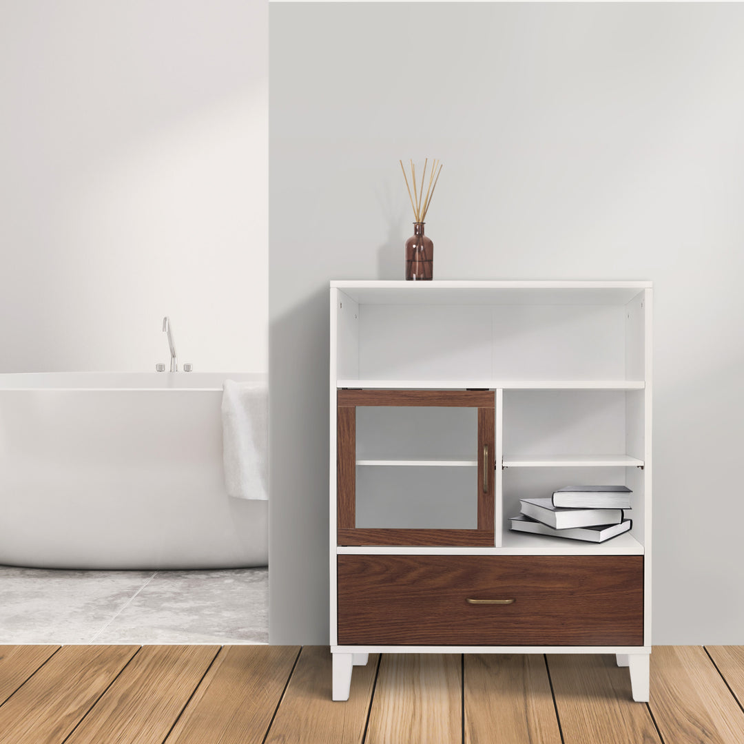 A white and wood floor cabinet with a top shelf, a 1/2 cabinet with glass door, and a bottom drawer