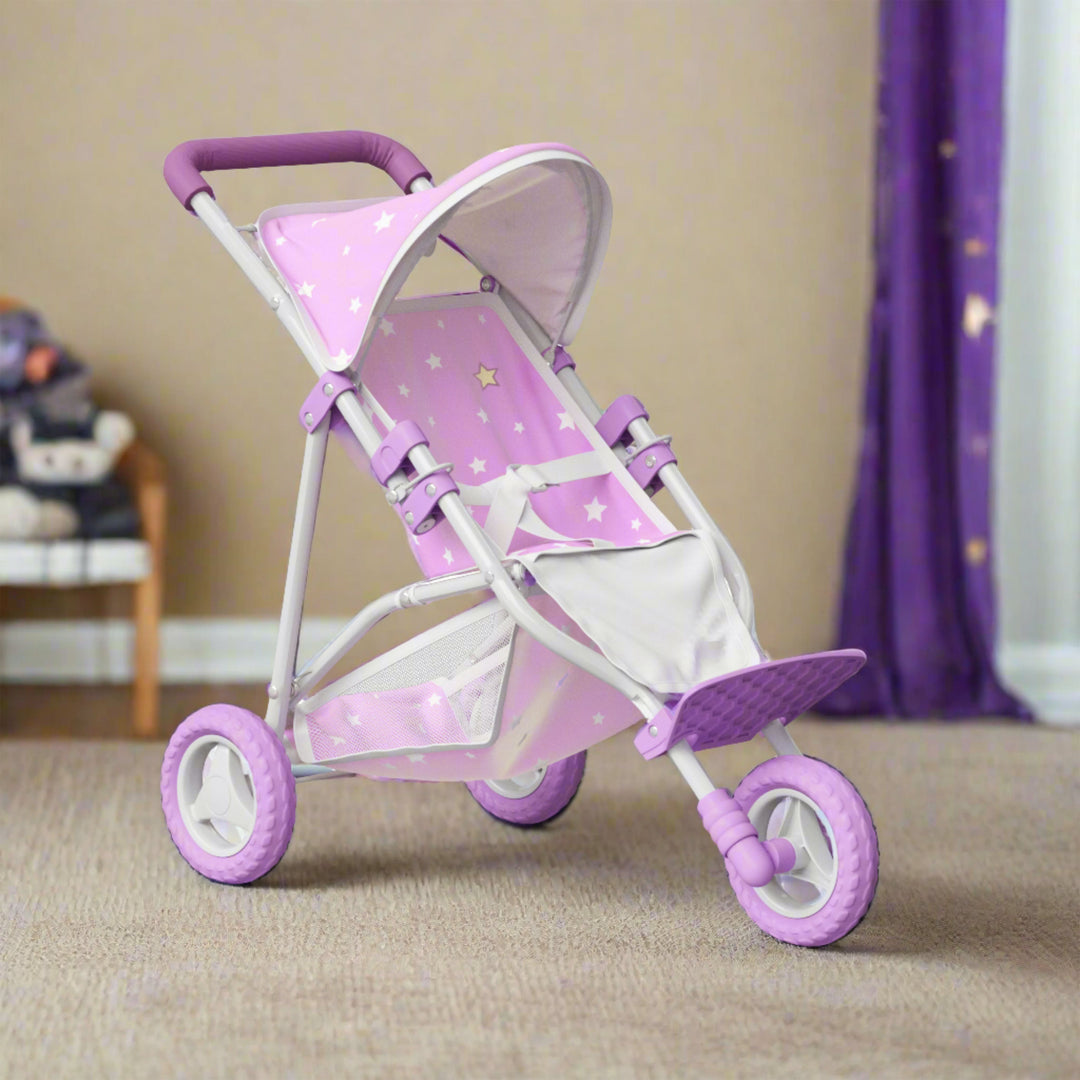 the purple jogging style stroller for baby dolls is on a walkway in a park