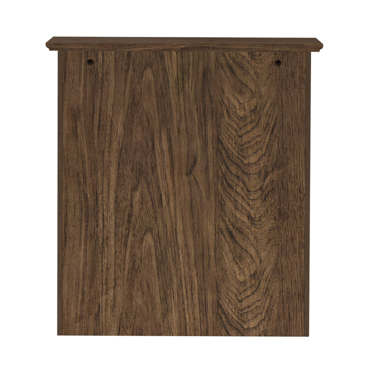 Back view of a walnut finished wall cabinet.