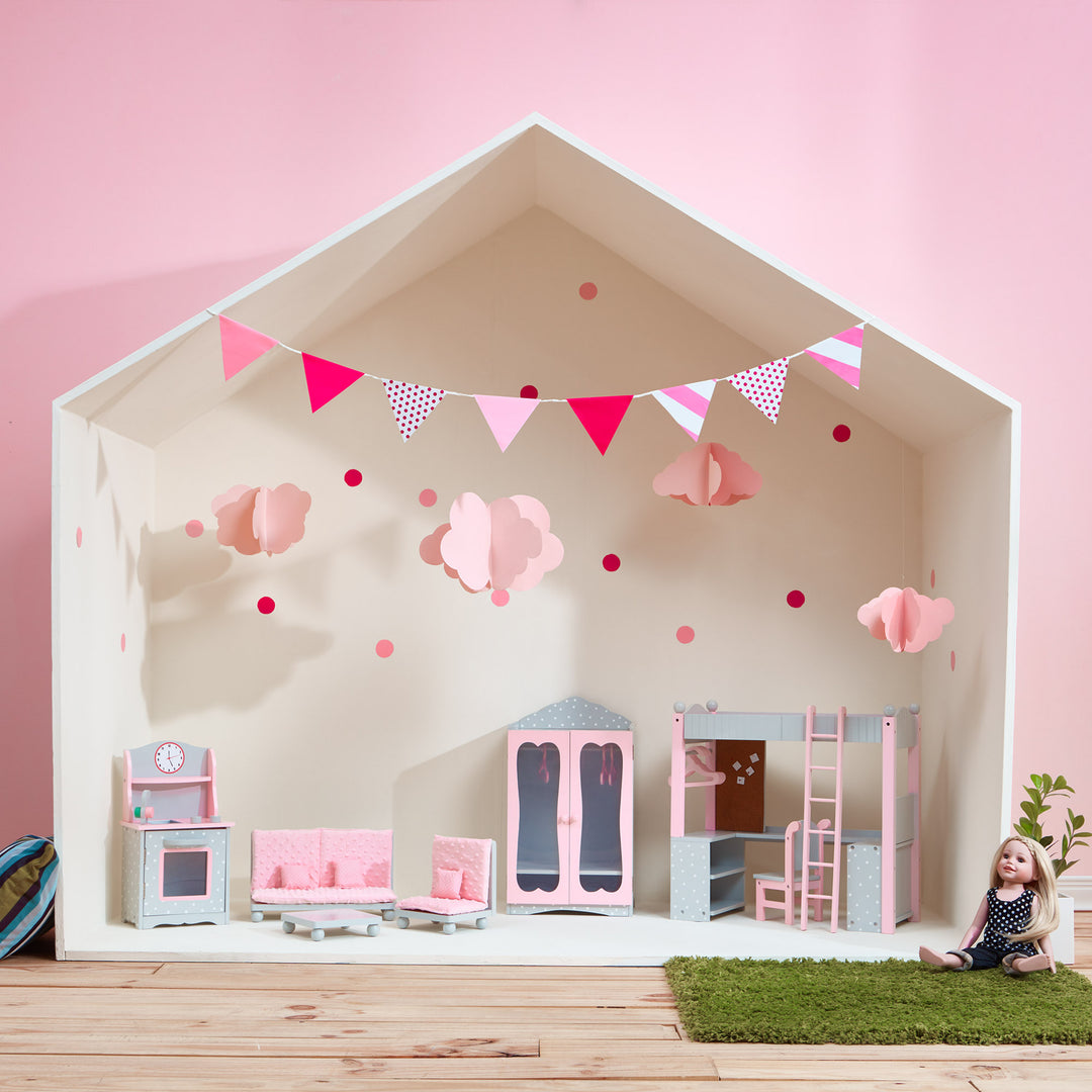 A set of gray furnishings with white polka dots with pink accents on cushions: kitchenette, couch , chair and coffee table, double-door closet and loft bed with desk, chair and ladder.