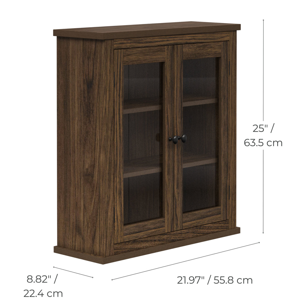 Dimensional graphic for a walnut finished wall cabinet with cabinet, two doors, in inches and centimeters.