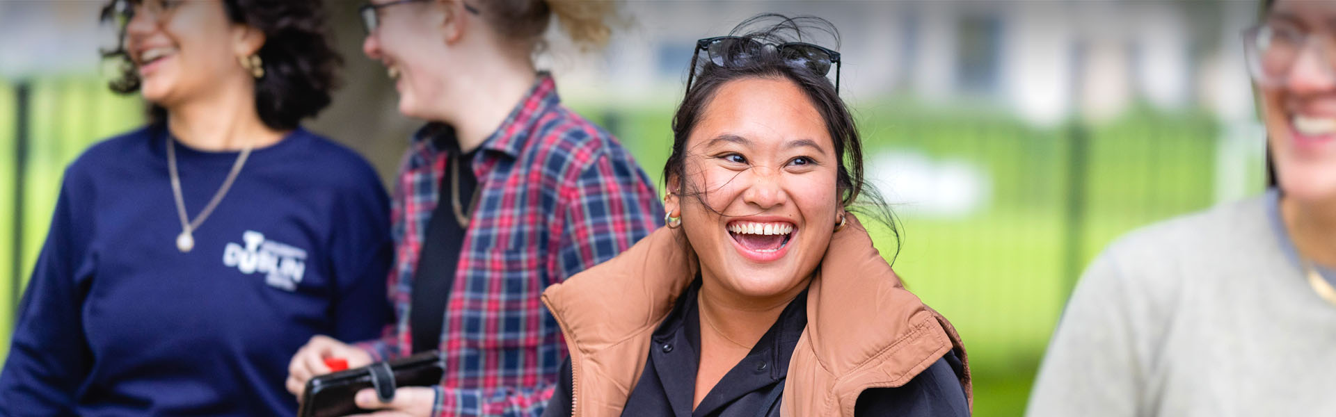 TU Dublin students laughing outdoors on grangegormancampus 