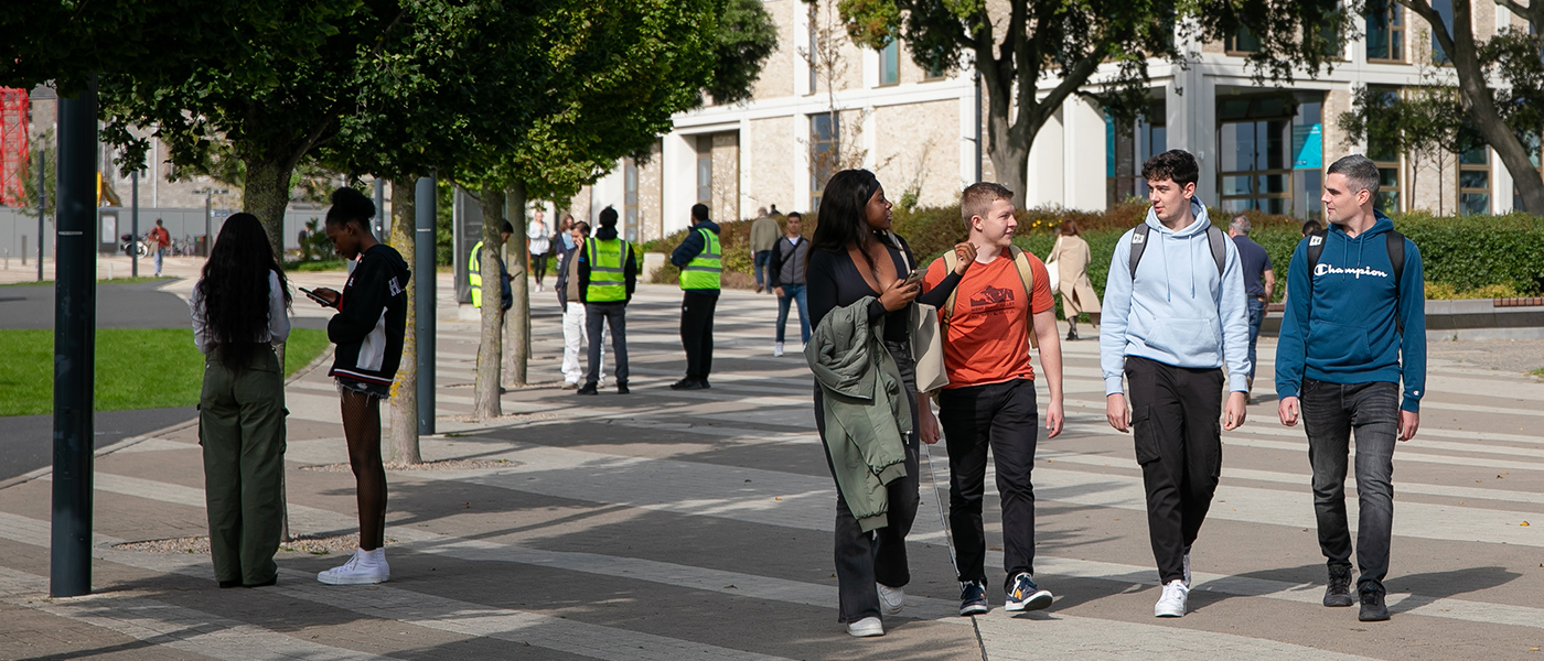 students walking outdoors grangegorman campus