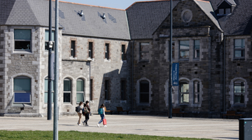 Image for Students talking under the TUDublin sign at Grangegorman