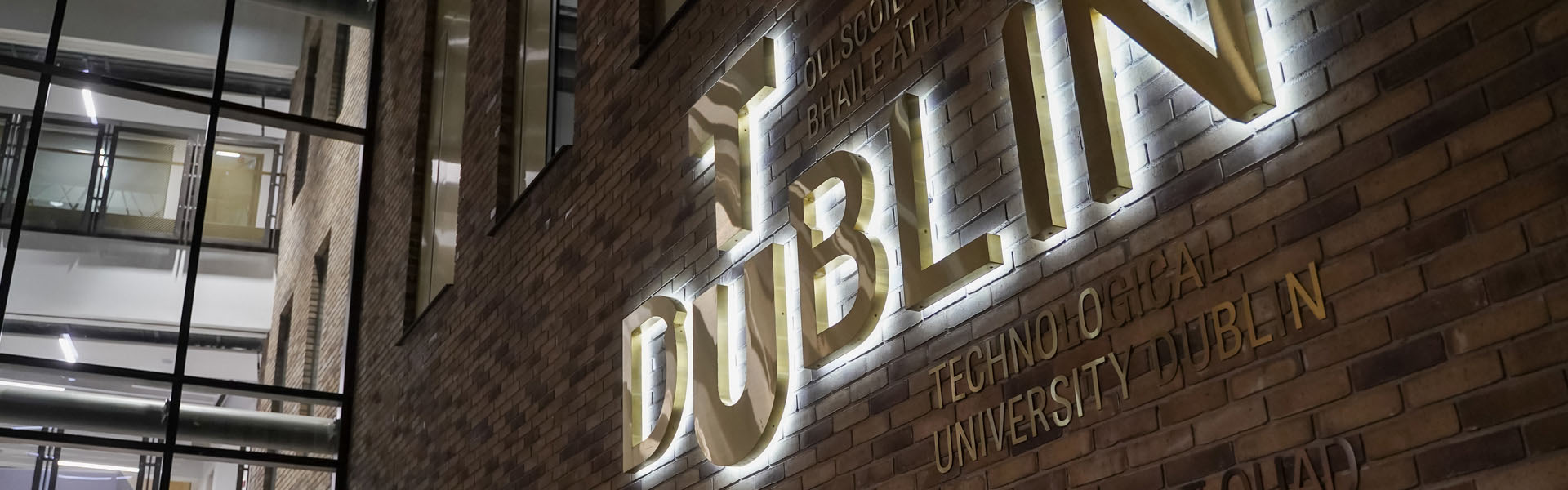 TU Dublin brass sign on East Quad building